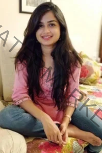 Call girl sitting on bed